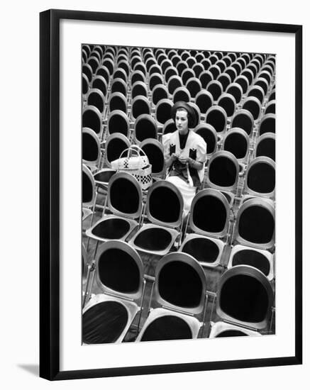 Singer Jane Froman Knitting in Empty Studio Audience Chairs During a Radio Broadcast Rehearsal-Alfred Eisenstaedt-Framed Premium Photographic Print