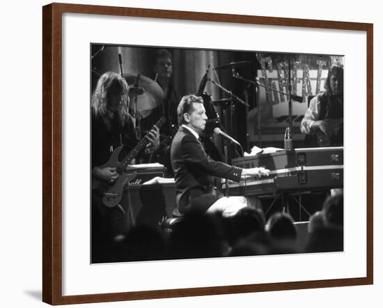 Singer Jerry Lee Lewis Performing at Party for Film "Great Balls of Fire," Based on His Life Story-David Mcgough-Framed Premium Photographic Print