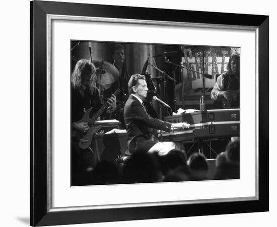 Singer Jerry Lee Lewis Performing at Party for Film "Great Balls of Fire," Based on His Life Story-David Mcgough-Framed Premium Photographic Print