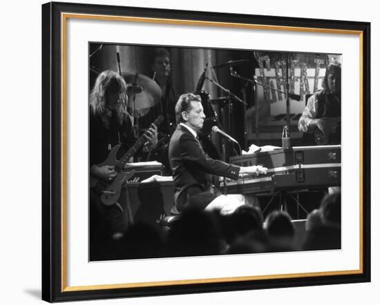 Singer Jerry Lee Lewis Performing at Party for Film "Great Balls of Fire," Based on His Life Story-David Mcgough-Framed Premium Photographic Print