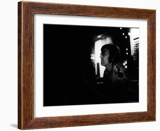 Singer John Lennon Working on His Album "Mind Games" at the Record Plant-David Mcgough-Framed Premium Photographic Print