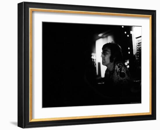 Singer John Lennon Working on His Album "Mind Games" at the Record Plant-David Mcgough-Framed Premium Photographic Print