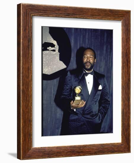 Singer Marvin Gaye Holding His Award in Press Room at Grammy Awards-null-Framed Premium Photographic Print