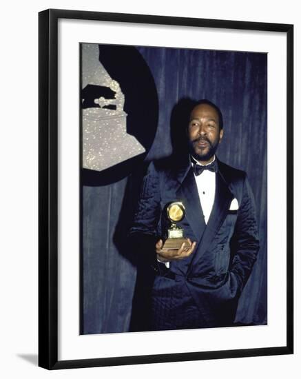 Singer Marvin Gaye Holding His Award in Press Room at Grammy Awards-null-Framed Premium Photographic Print