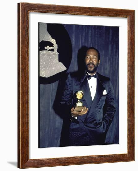 Singer Marvin Gaye Holding His Award in Press Room at Grammy Awards-null-Framed Premium Photographic Print