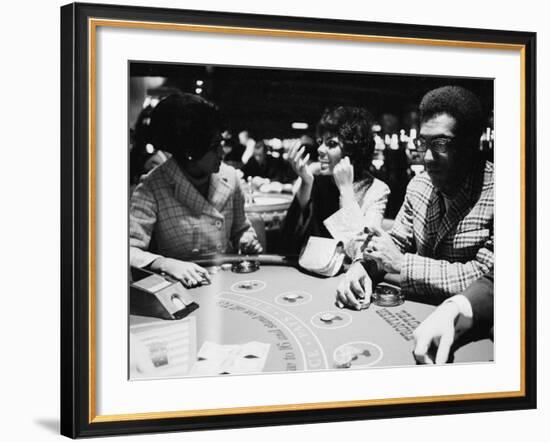 Singer Nancy Wilson, Actress Leslie Uggams, and Comedian Bill Cosby Playing Blackjack at the Sands-null-Framed Premium Photographic Print