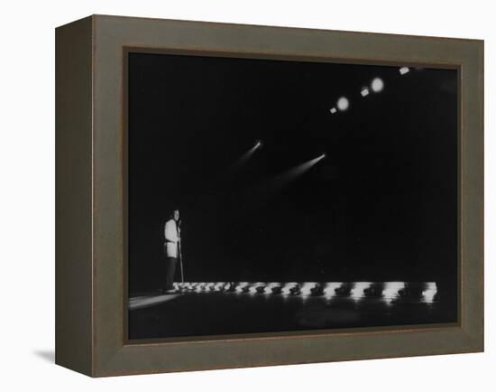 Singer Pat Boone Singing into Mike in Front of the Footlights on Stage in Auditorium-null-Framed Premier Image Canvas