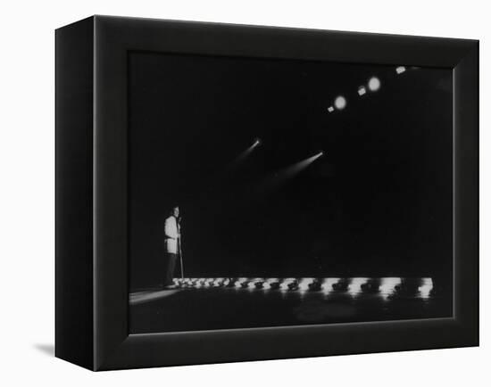 Singer Pat Boone Singing into Mike in Front of the Footlights on Stage in Auditorium-null-Framed Premier Image Canvas