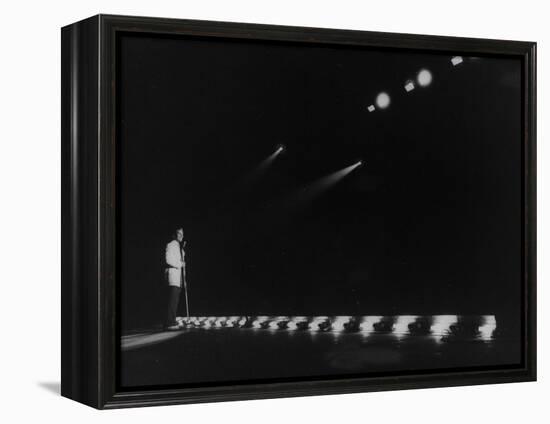 Singer Pat Boone Singing into Mike in Front of the Footlights on Stage in Auditorium-null-Framed Premier Image Canvas