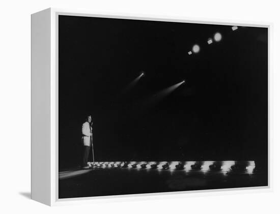 Singer Pat Boone Singing into Mike in Front of the Footlights on Stage in Auditorium-null-Framed Premier Image Canvas