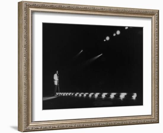 Singer Pat Boone Singing into Mike in Front of the Footlights on Stage in Auditorium-null-Framed Photographic Print