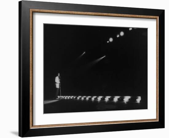 Singer Pat Boone Singing into Mike in Front of the Footlights on Stage in Auditorium-null-Framed Photographic Print