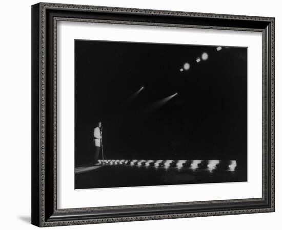 Singer Pat Boone Singing into Mike in Front of the Footlights on Stage in Auditorium-null-Framed Photographic Print