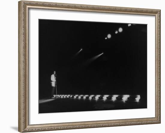 Singer Pat Boone Singing into Mike in Front of the Footlights on Stage in Auditorium-null-Framed Photographic Print