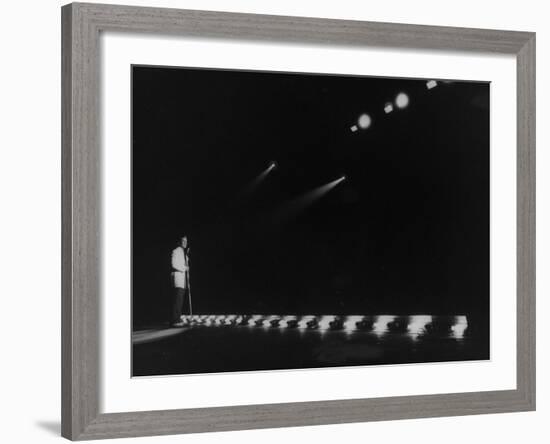 Singer Pat Boone Singing into Mike in Front of the Footlights on Stage in Auditorium-null-Framed Photographic Print