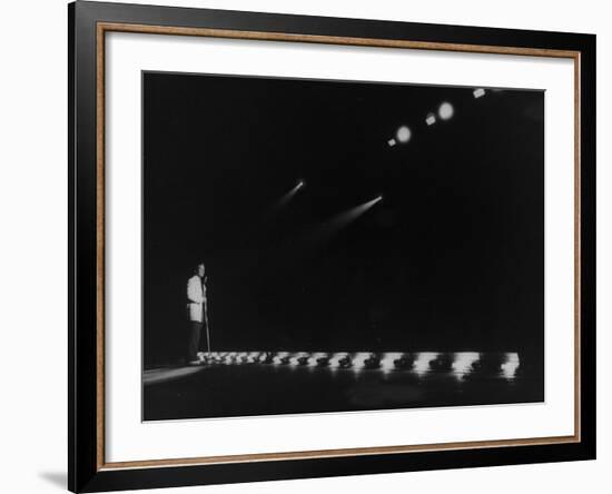 Singer Pat Boone Singing into Mike in Front of the Footlights on Stage in Auditorium-null-Framed Photographic Print