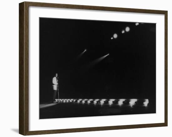 Singer Pat Boone Singing into Mike in Front of the Footlights on Stage in Auditorium-null-Framed Photographic Print