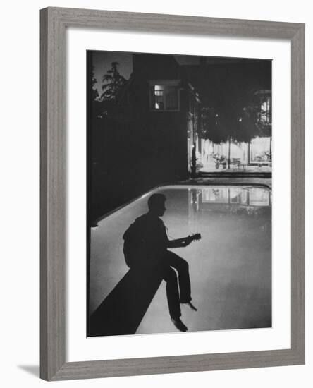 Singer Ricky Nelson Playing Guitar on Poolside-Ralph Crane-Framed Premium Photographic Print