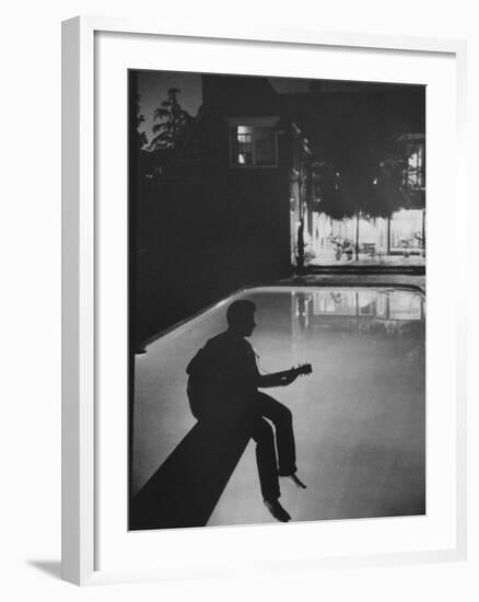 Singer Ricky Nelson Playing Guitar on Poolside-Ralph Crane-Framed Premium Photographic Print