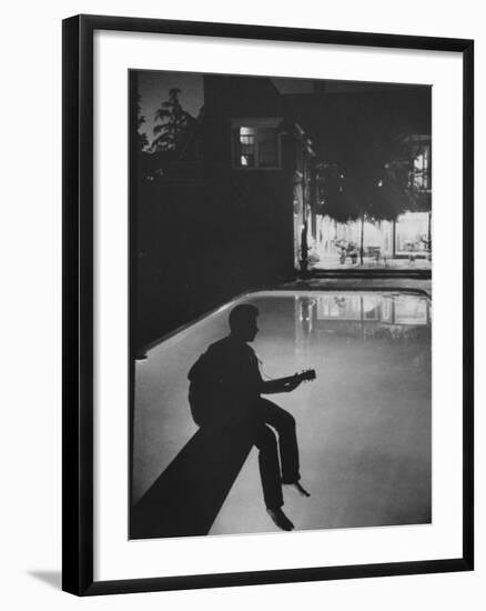 Singer Ricky Nelson Playing Guitar on Poolside-Ralph Crane-Framed Premium Photographic Print