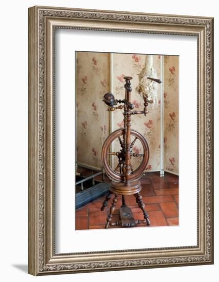 Sintra, Portugal. National Palace interior. Spinning wheel by the fireplace (Editorial Use Only)-Julien McRoberts-Framed Photographic Print