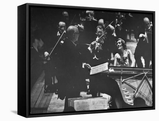 Sir Thomas Beecham Conducting Orchestra as Lady Beecham Plays Piano-Michael Rougier-Framed Premier Image Canvas