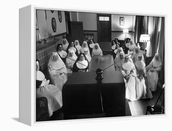 Sisters at St. Vincent's Hospital in Recreation Room Watching Program from New Local TV Station-Ralph Morse-Framed Premier Image Canvas