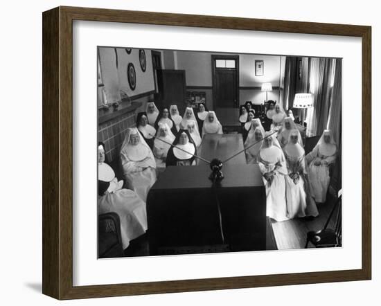 Sisters at St. Vincent's Hospital in Recreation Room Watching Program from New Local TV Station-Ralph Morse-Framed Photographic Print