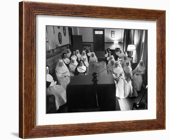 Sisters at St. Vincent's Hospital in Recreation Room Watching Program from New Local TV Station-Ralph Morse-Framed Photographic Print