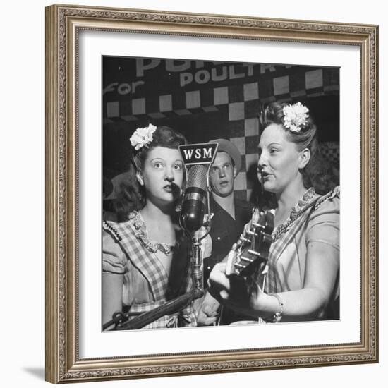 Sisters Performing at the Microphone at the Grand Ole Opry-Ed Clark-Framed Photographic Print