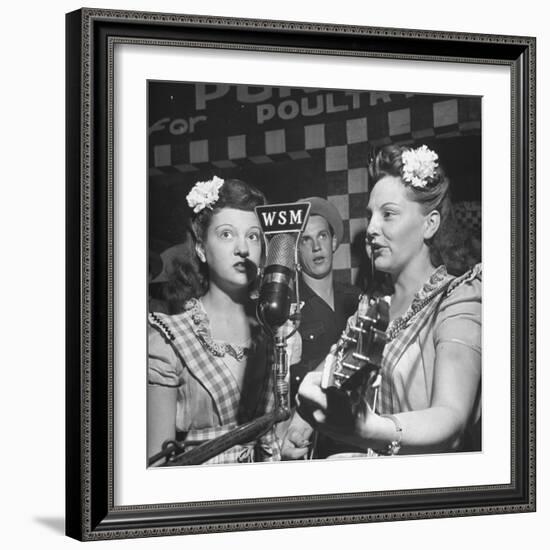 Sisters Performing at the Microphone at the Grand Ole Opry-Ed Clark-Framed Photographic Print