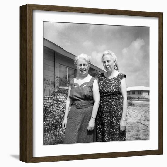 Sisters Pose in the Yard of a Suburban Cleveland Home, Ca. 1966.-Kirn Vintage Stock-Framed Photographic Print