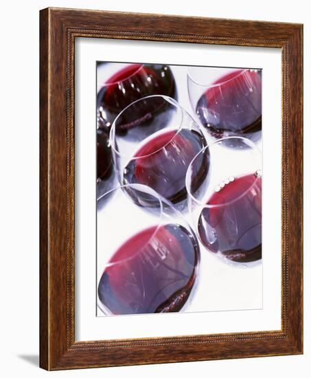 Six Glasses of Red Wine Against White Background-Linda Burgess-Framed Photographic Print