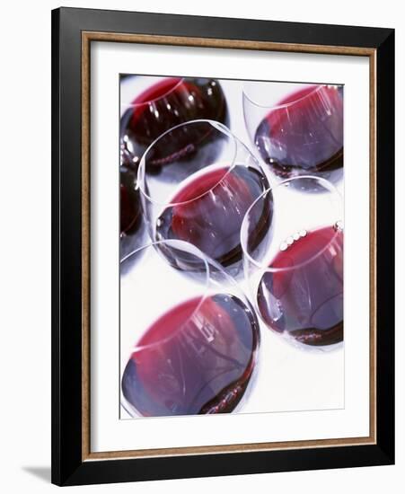 Six Glasses of Red Wine Against White Background-Linda Burgess-Framed Photographic Print