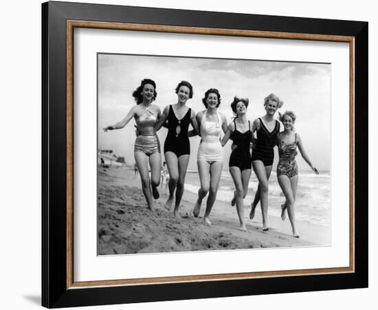 Six Women, in Swimsuits, Run in a Row Along a Beach, 1942-null-Framed Photographic Print