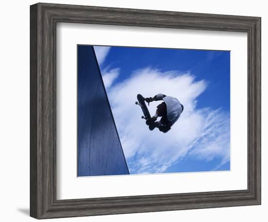 Skateboarder in Action over the Vert-null-Framed Photographic Print