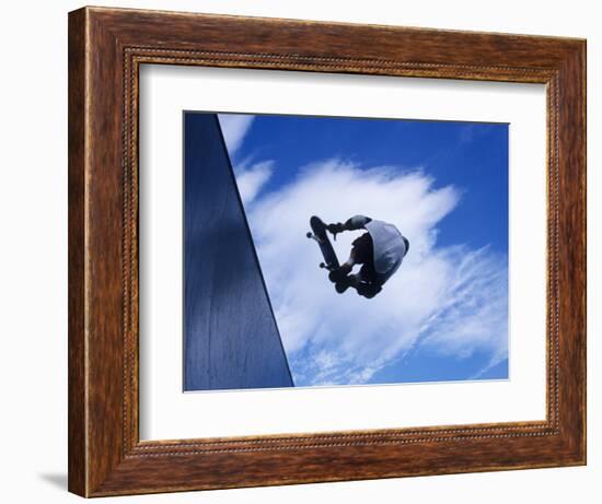 Skateboarder in Action over the Vert-null-Framed Photographic Print