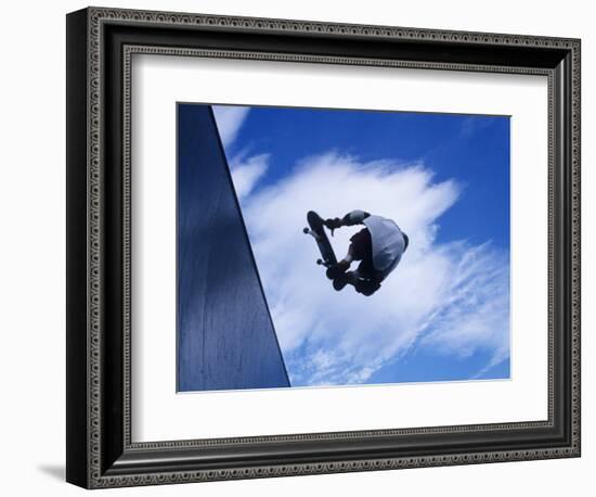 Skateboarder in Action over the Vert-null-Framed Photographic Print
