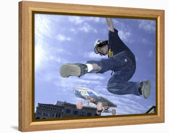 Skateboarder in Midair Doing a Trick-null-Framed Premier Image Canvas