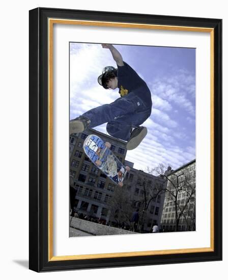 Skateboarder in Midair Doing a Trick-null-Framed Photographic Print