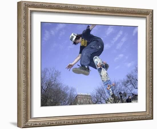 Skateboarder in Midair Doing a Trick-null-Framed Photographic Print