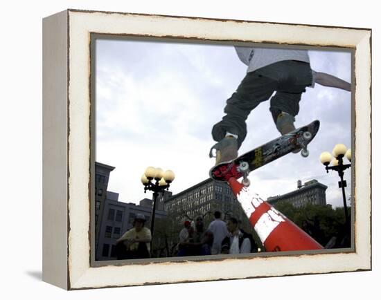 Skateboarder in Midair Knocking Over a Cone-null-Framed Premier Image Canvas
