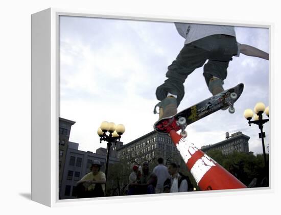 Skateboarder in Midair Knocking Over a Cone-null-Framed Premier Image Canvas