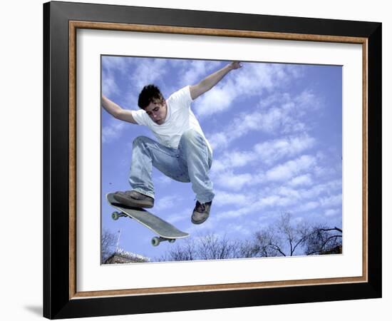 Skateboarder in Midair-null-Framed Photographic Print