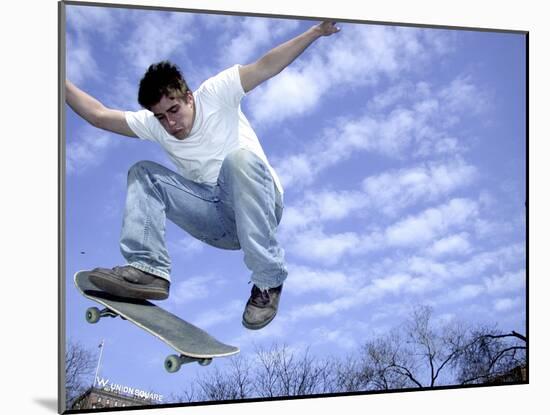 Skateboarder in Midair-null-Mounted Photographic Print