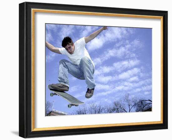 Skateboarder in Midair-null-Framed Photographic Print