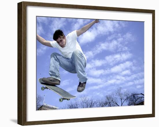 Skateboarder in Midair-null-Framed Photographic Print