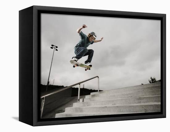 Skateboarder Performing Tricks-null-Framed Premier Image Canvas