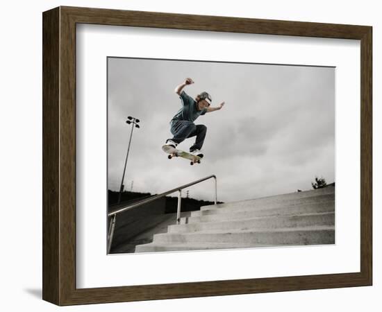 Skateboarder Performing Tricks-null-Framed Photographic Print