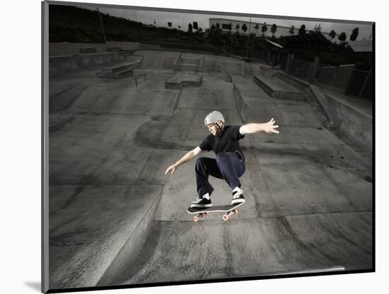 Skateboarder Performing Tricks-null-Mounted Photographic Print